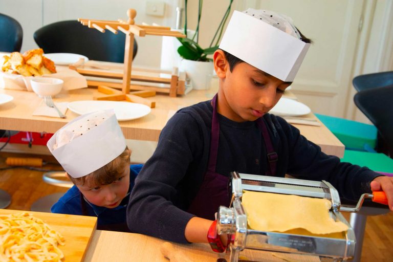 Kids during a Pasta Workshop of Rome for kids