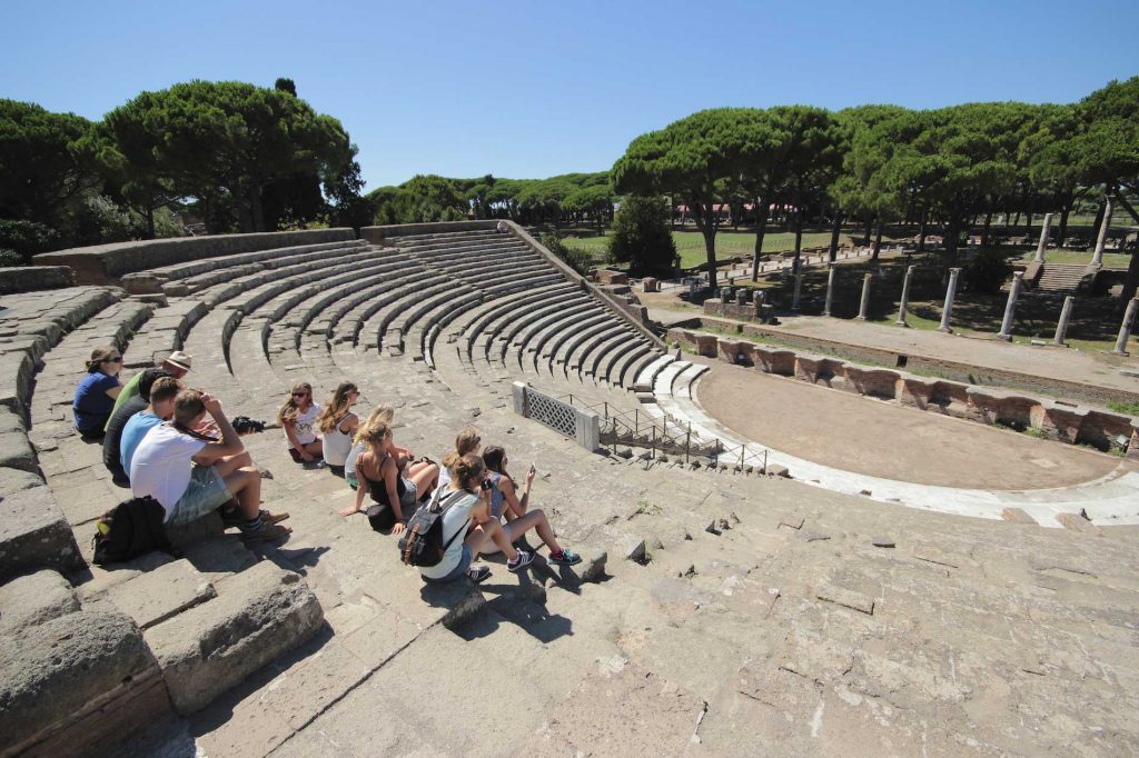 Teens visiting the archeological site of Ostia Antica. Organize your visit with Rome for kids