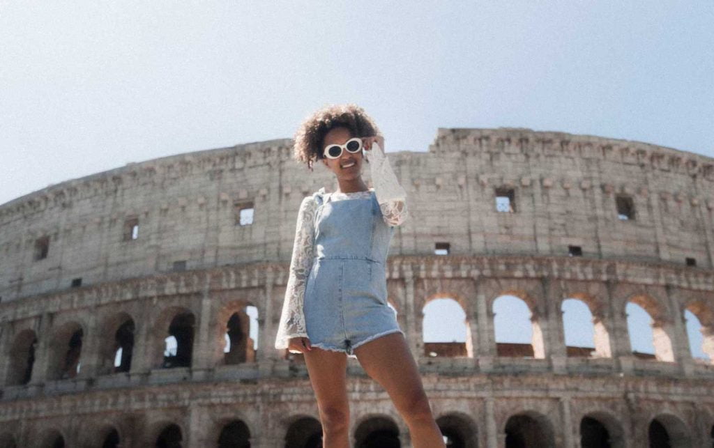 Teen girl in front of the Colosseum during a Rome for kids Ancient Rome Tour